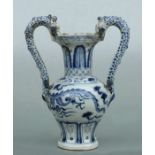 A Chinese blue & white two-handled vase decorated with a dragon amongst clouds chasing a flaming
