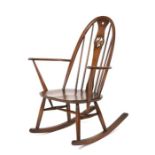 An Ercol swan back rocking chair.