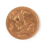 An Edward VII 1904 gold half sovereign.