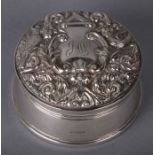A Victorian style silver lidded jewellery box decorated with birds and flowers, initialled,