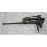 A late 19th century blacksmiths leg vice, 101cms long.