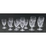 A set of eight Waterford crystal Colleen pattern sherry glasses and four similar small wine