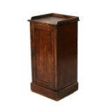 A Victorian walnut pot cupboard, the galleried top above panelled doors, on a plinth base, 39cms