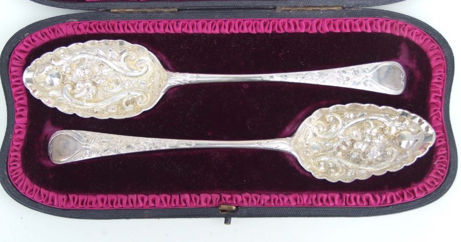 A pair of George III silver berry spoons, 22cms long, indistinct Newcastle hallmark and makers - Image 2 of 3