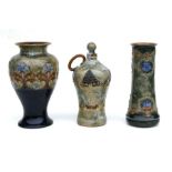 Two Royal Doulton stoneware vase, 26cms high; together with a Royal Doulton stoneware flagon,
