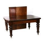 A Victorian mahogany extending dining table with two extra leaves, 115 by 230cms extended.