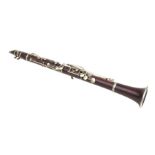 A late 19th / early 20th century five-piece hardwood clarinet, the thumb support stamped 'JTL',