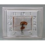 An Art Deco frosted glass mantle clock in the manner of Leon Hattot, 23cms wide.Condition