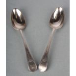 A pair of George III bright cut silver serving spoons, initialled, London 1786, 22cms long, 122g (
