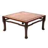 A Chinese hardwood kang or low table, 59cms wide.