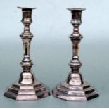A pair of French silver plated candlesticks with octagonal stepped bases and knopped stems, 25cms