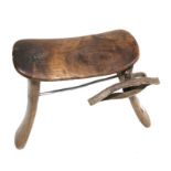 A Kenyan wooden head rest, 16cms wide, with repairs.