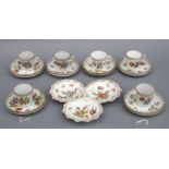 A Dresden tea set decorated with flowers and gilt highlights; together with a matching three-