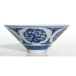 A Chinese blue & white bowl decorated with stylised dragons, six character blue mark to the
