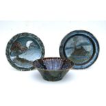 Two Eeles Family Studio pottery chargers, the largest 36cms; together with a Peinn Mor Studio