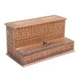 A carved hardwood table top stamp box, 25cms wide.