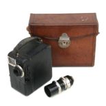 A Pathe Motocamera no: V52954; together with a Laack Rathenow 261068 Dialytar 1.35 lens (2).