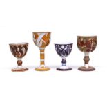 Alan Caiger-Smith: Four Aldermaston pottery goblets with slip decoration, various styles and