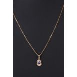 A 9ct gold amethyst and diamond pendant on a 925 gold plated box link chain.Condition ReportThis