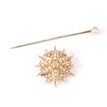 A Victorian yellow metal seed pearl and diamond star brooch, 7.3g, 3cms diameter; together with a