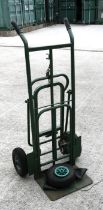 A pair of heavy duty adaptable sack trucks; together with spare tyre and tube.
