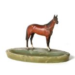 A large Austrian cold painted bronze horse mounted on a green onyx ashtray base, makers mark to