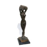 A bronze study of a naked female on a marble plinth, signed 'J Price', 51cms high.