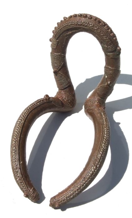 African Art / Tribal Art: a Chad bronze Kenga armlet with overall decoration, 18cms long. - Image 2 of 2