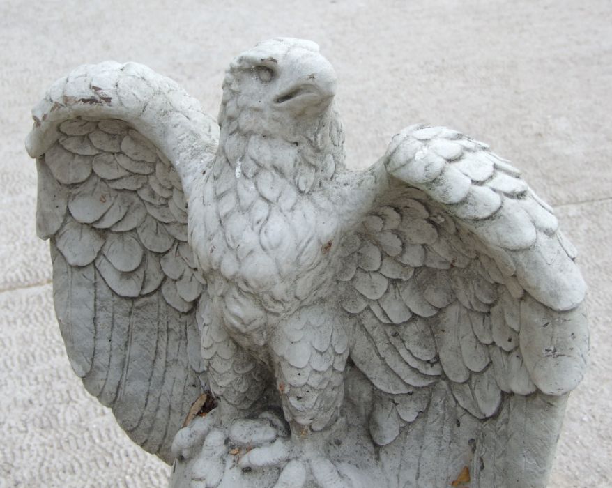 A large pair of stoneware garden eagles perched on a sphere with their wings outswept, 97cms high ( - Image 5 of 5