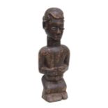 African Art / Tribal Art: a carved wooden Teke / Yanzi male figure, 52cms high.