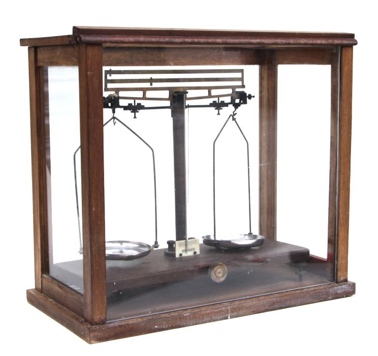 A cased set of Griffin & Tatlock laboratory scales, marked 'Duorider', 46cms wide.