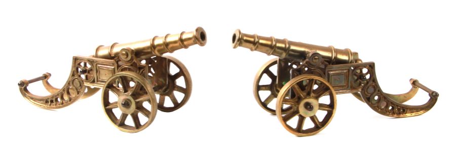 A pair of brass models of cannons, 44cms long (2).