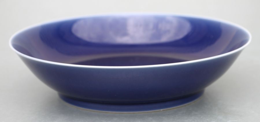 A Chinese blue glazed shallow dish with Daoguang mark. 19cm diameter