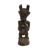 African Art / Tribal Art: An early Songye female figure. 27cm high: Provenance: Part of the Peran
