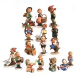 A quantity of Goebel Hummel figures to include March Winds, Strolling Along, Goose Girl, Apple