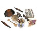 A group of ethnic tribal items to include a Kapsiki people Cameroon beadwork bag, Zulu balls, spoon,