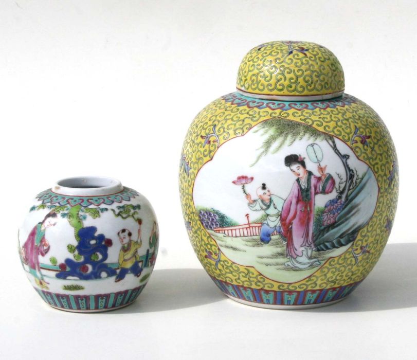 A Chinese famille rose ginger jar and cover decorated with figures in a terraced garden within