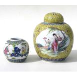 A Chinese famille rose ginger jar and cover decorated with figures in a terraced garden within