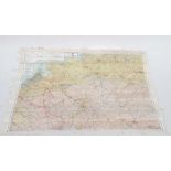 A coloured map, Holland, Belgium, France and Germany, printed on silk, 70cm by 70cm