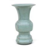 A Chinese celadon crackle glaze Gu vase, 23cms high.