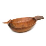 A Scandinavian folk art treen bowl in the form of a duck, 33cms wide.