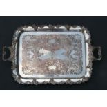 A Victorian silver plated two-handled butlers tray with grape and vine border, 69cms wide.