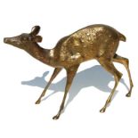 A cast brass figure in the form of a fawn, approx 40cms long.