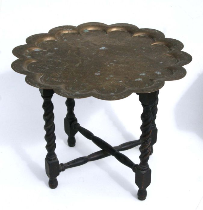 An Indo Persian brass topped tray table on barley twist stand, 52cm wide together with a brass