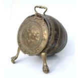 A brass mounted barrel form coal scuttle