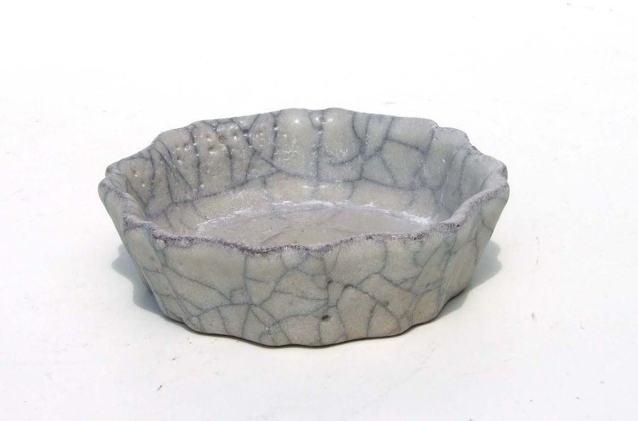 A Chinese crackle ware shallow dish or brush washer, 12cms diameter.