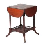 An Edwardian mahogany two tier drop flap occasional table, 46cm wide