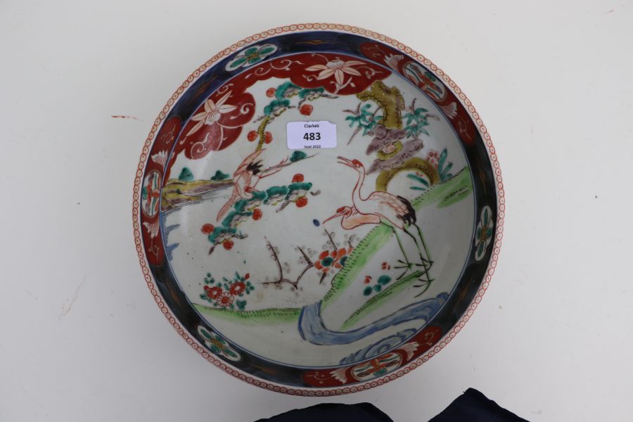 A Japanese Imari bowl decorated with birds in a river landscape, 25cms diameter together with a pair - Bild 15 aus 16