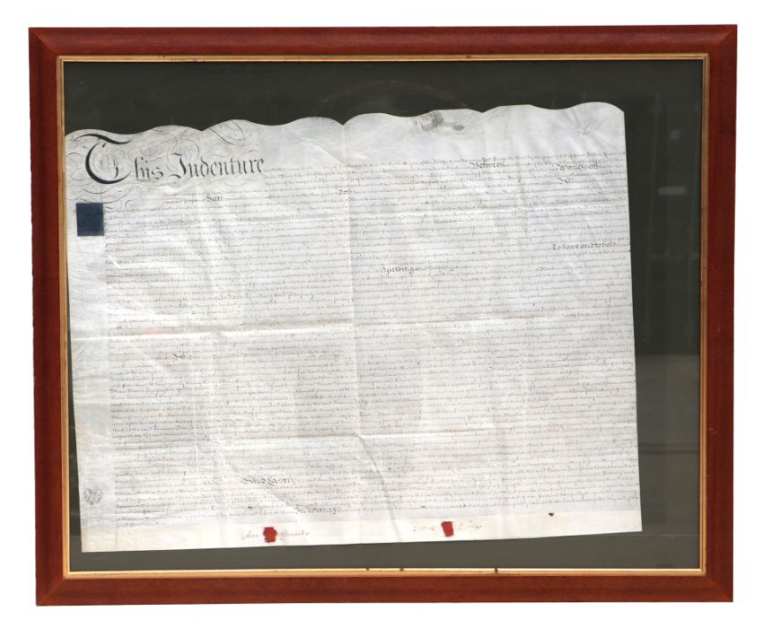 A Georgian indenture on vellum, framed & glazed.