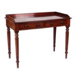 A Victorian mahogany writing table or library table with three-quarter gallery top above two